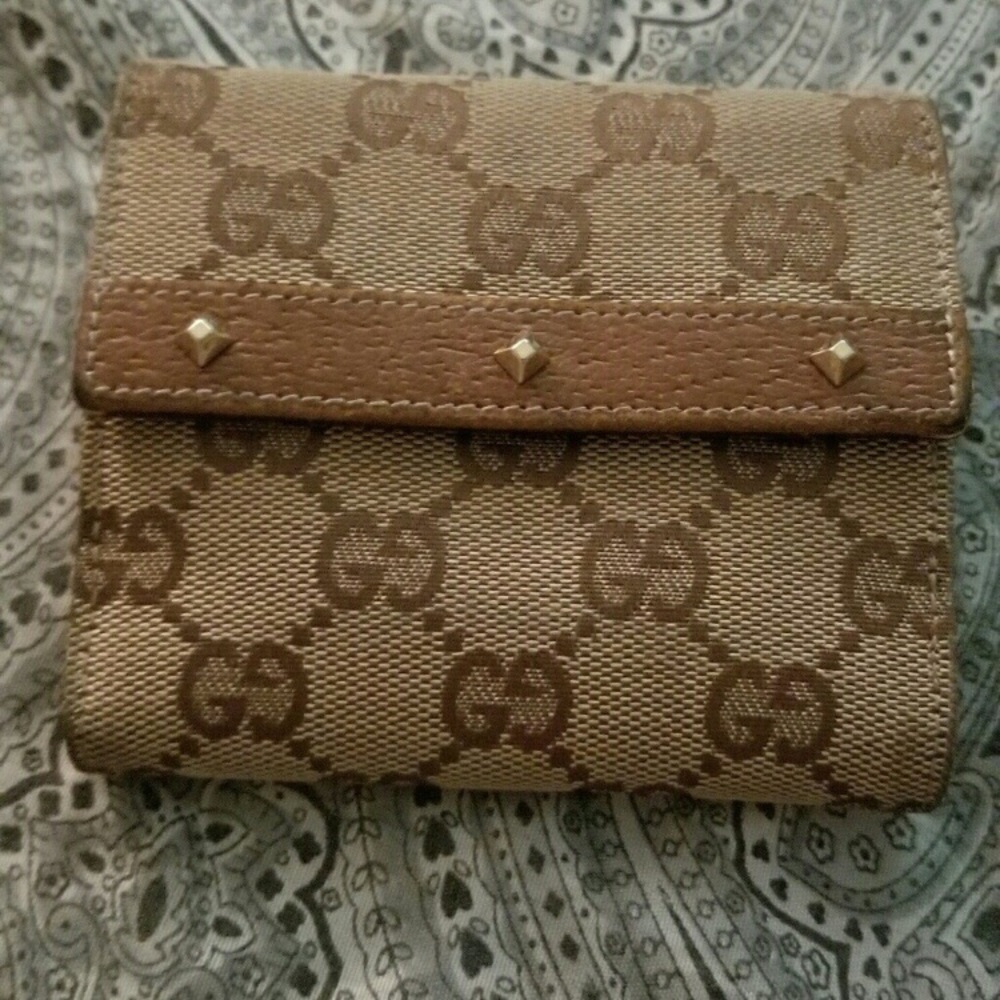 VERY RARE GUCCI MONOGRAM WALLET WITH STUDS.